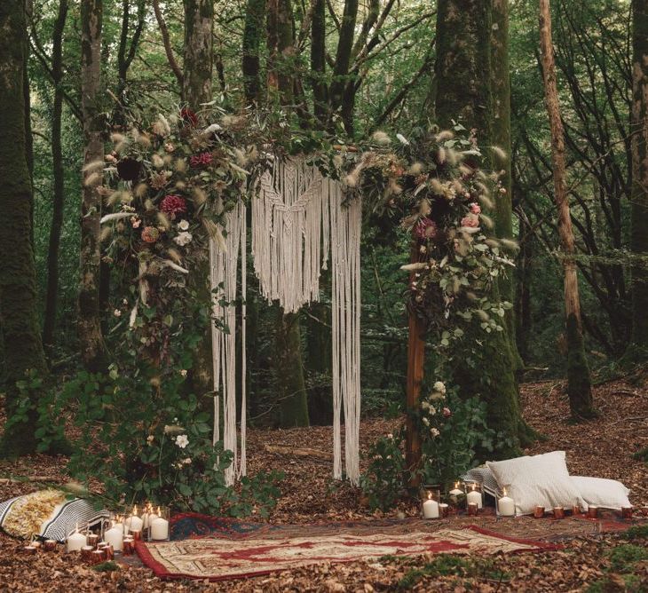 Wedding Ceremony Altar in the Woods with Macrame, Foliage and Dried Grass Decor