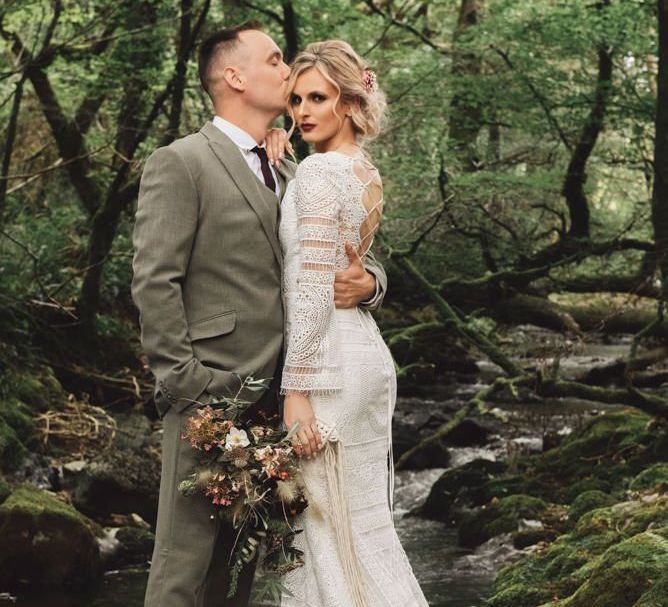 Bride in Lace Wedding Dress with Tie Back Detail