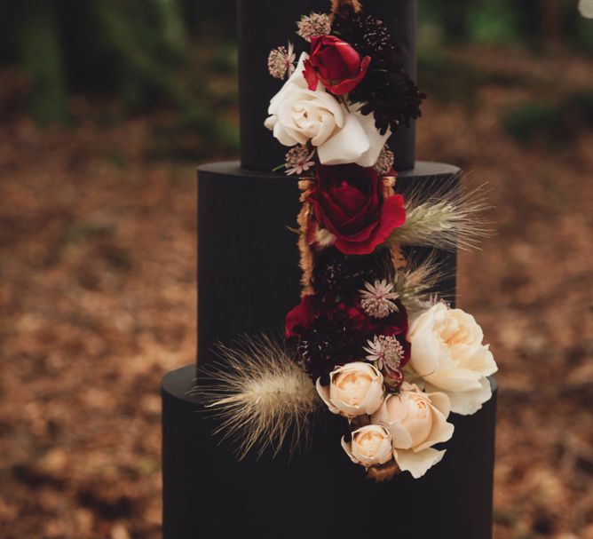 Black Square Wedding Cake with Cascading Wedding Flowers