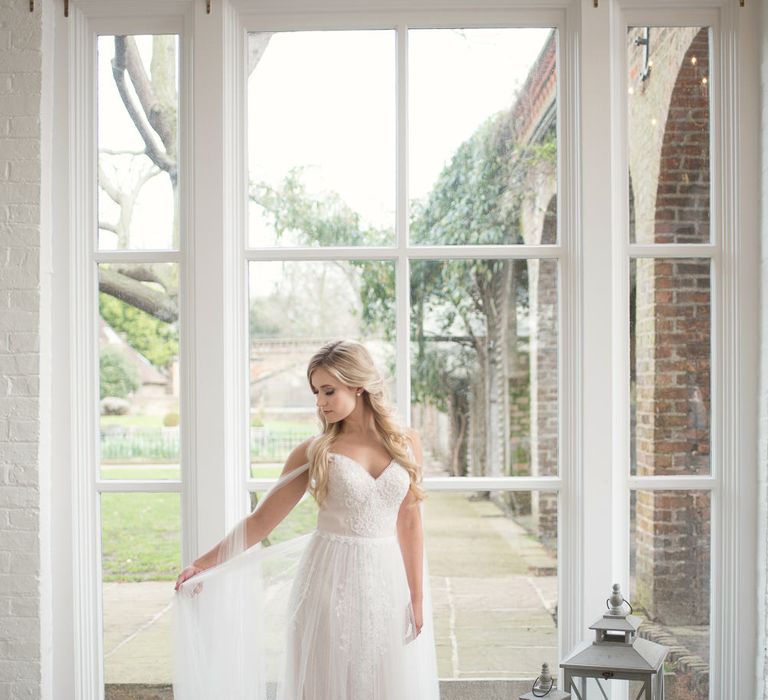 Bride in Nissa Now  from Chic Nostalgia | Super Luxe White, Grey &amp; Gold Elegant Wedding Inspiration at Orangery, Holland Park, Kensington, London | Planned &amp; Style day The Events Designers | Eva Tarnok Photography