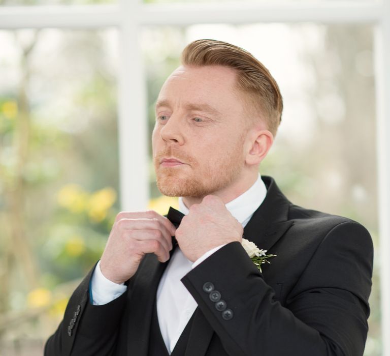 Groom in Black Tie Suit | Super Luxe White, Grey &amp; Gold Elegant Wedding Inspiration at Orangery, Holland Park, Kensington, London | Planned &amp; Style day The Events Designers | Eva Tarnok Photography