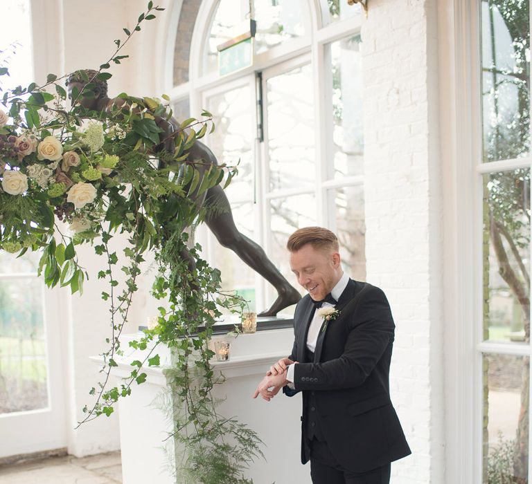 Groom in Black Tie Suit | Super Luxe White, Grey &amp; Gold Elegant Wedding Inspiration at Orangery, Holland Park, Kensington, London | Planned &amp; Style day The Events Designers | Eva Tarnok Photography