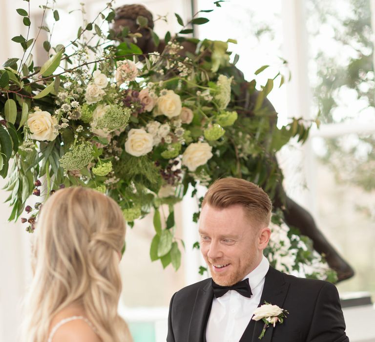 Bride in Nissa Now  from Chic Nostalgia | Groom in Black Tie Suit | Super Luxe White, Grey &amp; Gold Elegant Wedding Inspiration at Orangery, Holland Park, Kensington, London | Planned &amp; Style day The Events Designers | Eva Tarnok Photography