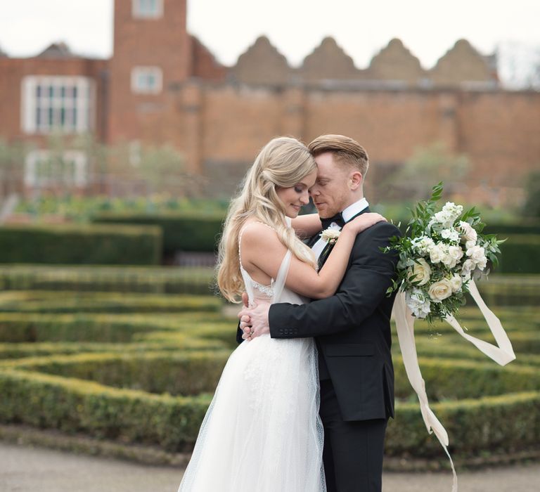 Bride in Nissa Now  from Chic Nostalgia | Groom in Black Tie Suit | Super Luxe White, Grey &amp; Gold Elegant Wedding Inspiration at Orangery, Holland Park, Kensington, London | Planned &amp; Style day The Events Designers | Eva Tarnok Photography