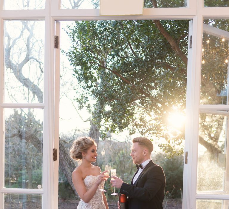 Bride in ‘Christelle’ by Anna Georgina and Kobus Dippenaar | Groom in Black Tie Suit | Super Luxe White, Grey &amp; Gold Elegant Wedding Inspiration at Orangery, Holland Park, Kensington, London | Planned &amp; Style day The Events Designers | Eva Tarnok Photography