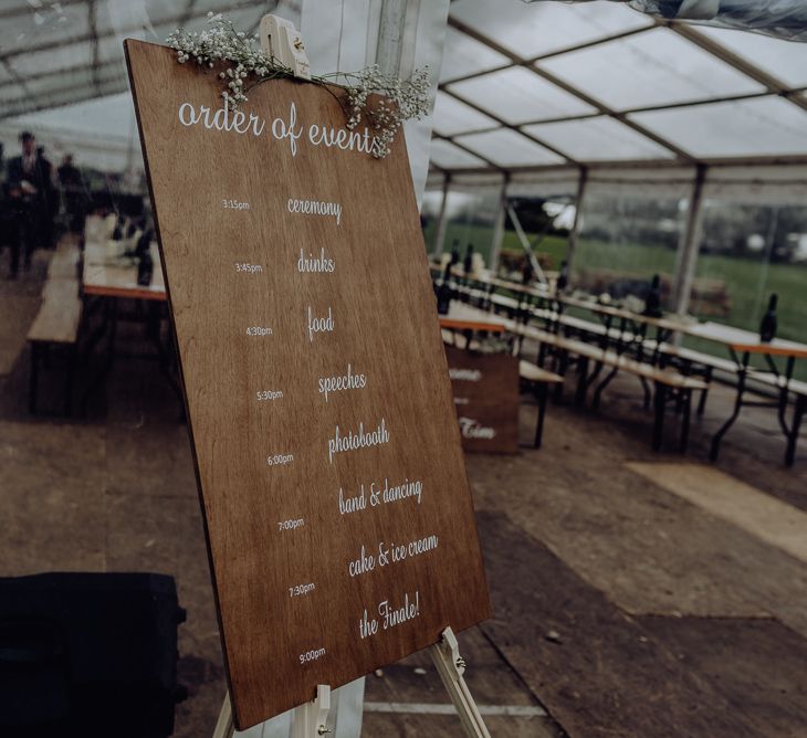 wooden order of the day wedding sign 