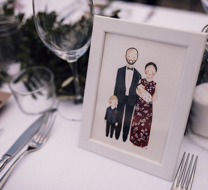 Illustrated Place Setting in White Frame | Foliage Table Runner | Pillar Candle in Jar | Rue de Seine Wedding Dress with Pronovias Overskirt, Personalised Place Setting Illustrations and Sweetheart Table | Samuel Docker Photography