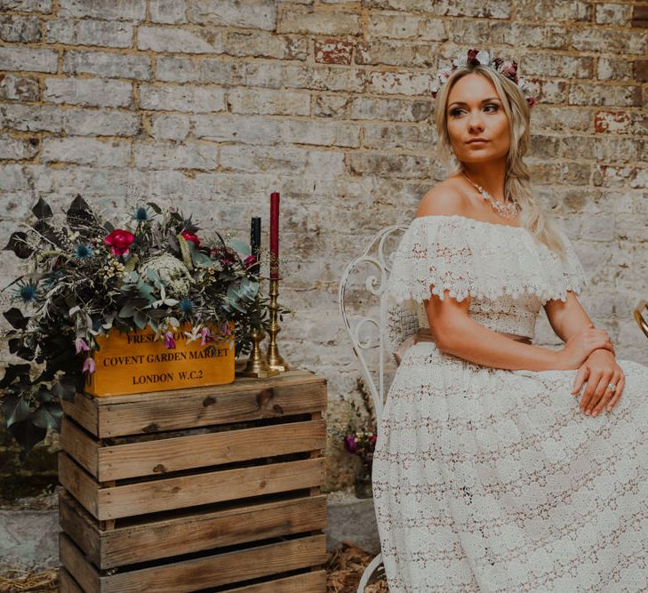 Boho Bride in Bardot Lace Wedding Dress with Crate Wedding Decor