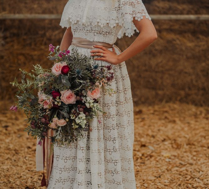 Bride in Lace Wedding Dress with Romantic Bridal Bouquet