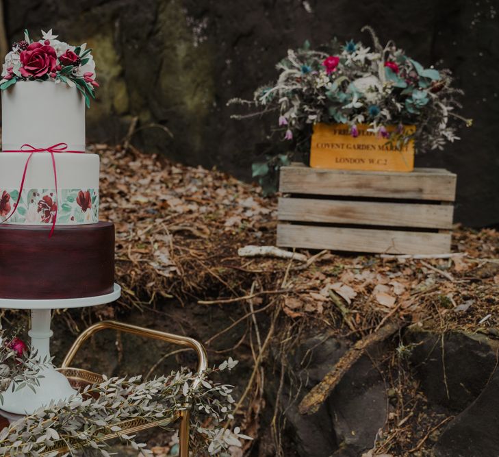 Three Tier Wedding Cake on Gold Drinks Trolley and  Wooden Crates Wedding Decor