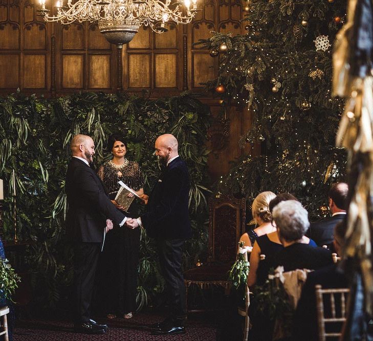 Groom &amp; Groom Exchanging Vows During The Wedding Ceremony