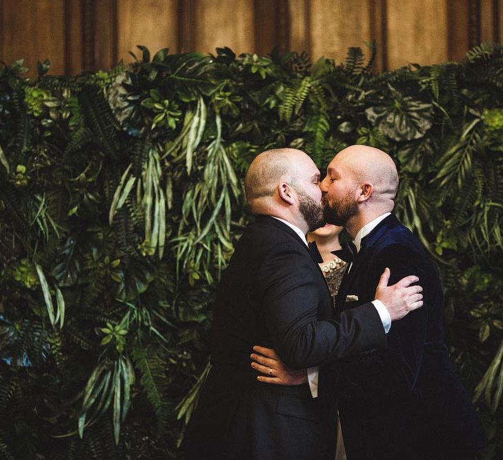 Groom &amp; Groom Just Married Kissing During The Wedding Ceremony