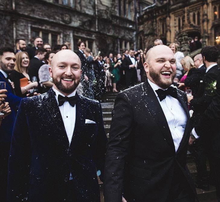 Smiling Groom &amp; Groom in Tuxedo's During Confetti Moment