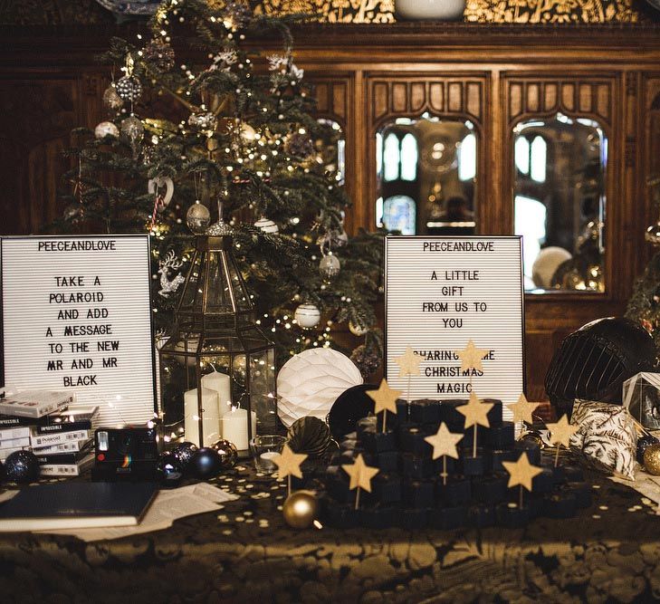 Wedding Favour Table with Peg Board Signs and Christmas Tree Backdrops