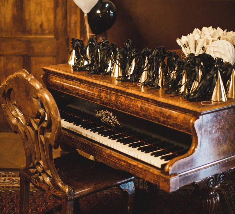 Piano with Gold &amp; Black Christmas hats