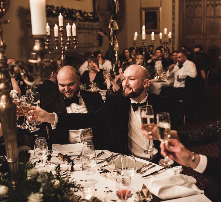 Groom and Groom Raising a Toast During the Wedding Reception