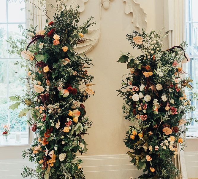 Vertical Autumn wedding flowers at Coworth Park