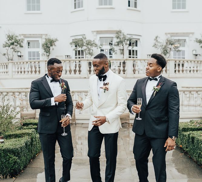 Groomsmen in tuxedos at Coworth Park wedding