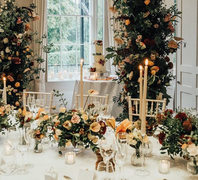 Intimate wedding reception with autumn flowers and candlelight