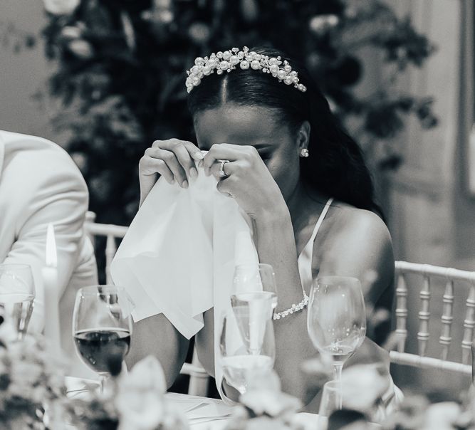 Emotional bride during wedding reception speeches