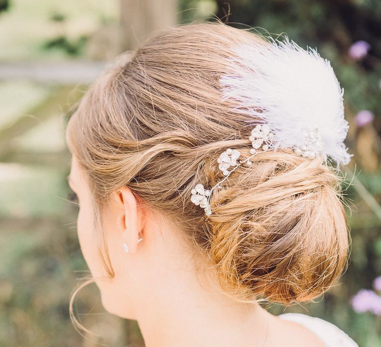 Chic Bun Bridal Up Do with Feather Headpiece | Pastel Peter Rabbit Spring Inspiration at River Cottage | Beatrix Potter | Mr McGregor's Garden | Jennifer Jane Photography