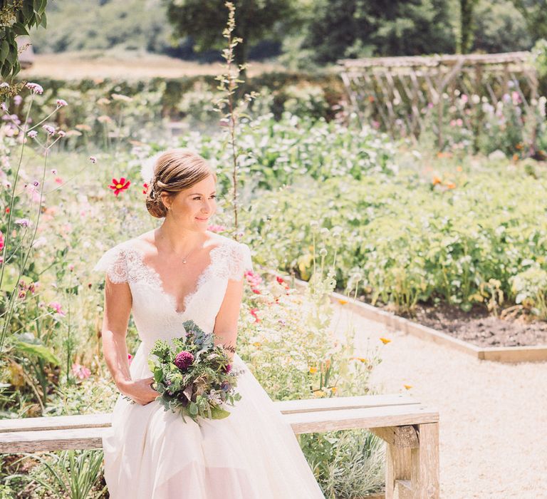 Bride in Lace Wedding Dress with Back Detail | Pastel Peter Rabbit Spring Inspiration at River Cottage | Beatrix Potter | Mr McGregor's Garden | Jennifer Jane Photography