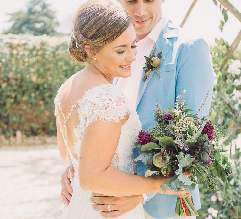 Bride in Lace Wedding Dress with Back Detail | Groom in Pale Blue Jacket &amp; Chino's | Pastel Peter Rabbit Spring Inspiration at River Cottage | Beatrix Potter | Mr McGregor's Garden | Jennifer Jane Photography