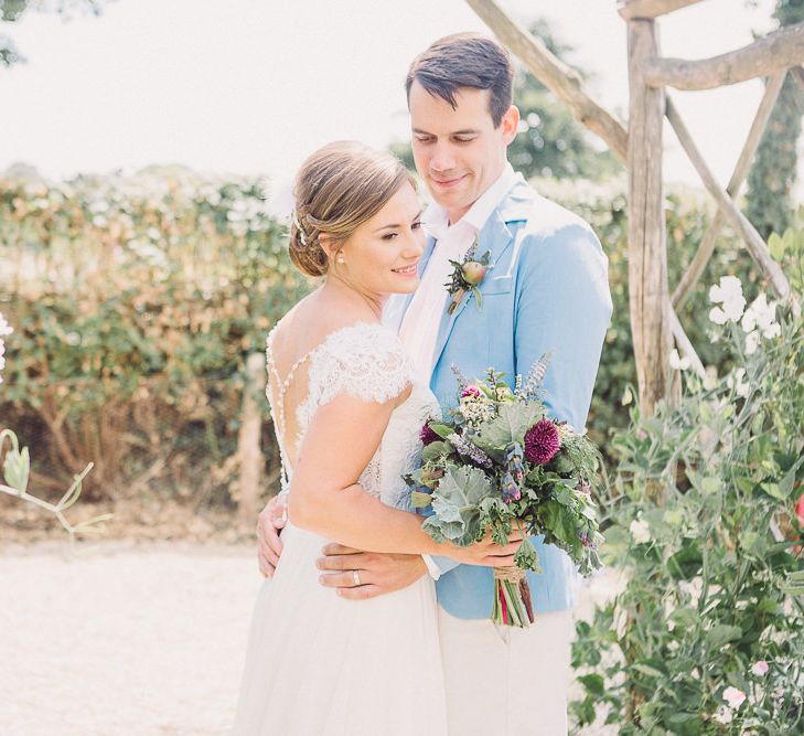 Bride in Lace Wedding Dress with Back Detail | Groom in Pale Blue Jacket &amp; Chino's | Pastel Peter Rabbit Spring Inspiration at River Cottage | Beatrix Potter | Mr McGregor's Garden | Jennifer Jane Photography