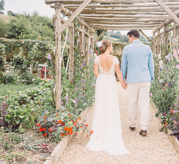 Bride in Lace Wedding Dress with Back Detail | Groom in Pale Blue Jacket &amp; Chino's | Pastel Peter Rabbit Spring Inspiration at River Cottage | Beatrix Potter | Mr McGregor's Garden | Jennifer Jane Photography