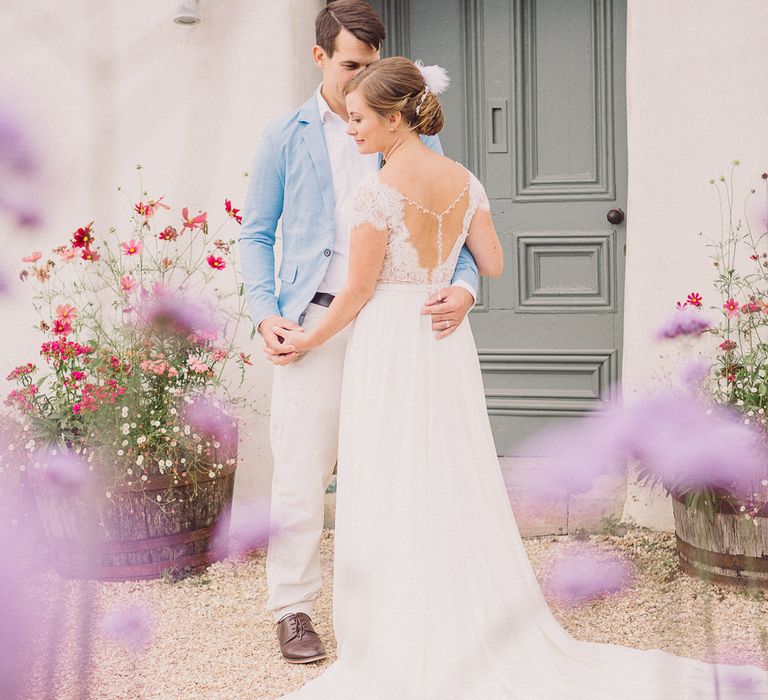 Bride in Lace Wedding Dress with Back Detail | Groom in Pale Blue Jacket &amp; Chino's | Pastel Peter Rabbit Spring Inspiration at River Cottage | Beatrix Potter | Mr McGregor's Garden | Jennifer Jane Photography