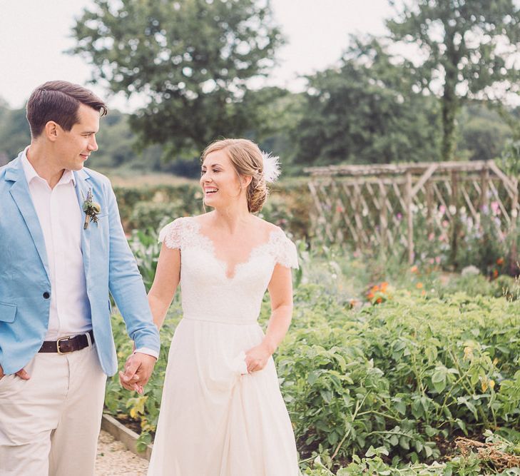 Bride in Lace Wedding Dress with Back Detail | Groom in Pale Blue Jacket &amp; Chino's | Pastel Peter Rabbit Spring Inspiration at River Cottage | Beatrix Potter | Mr McGregor's Garden | Jennifer Jane Photography