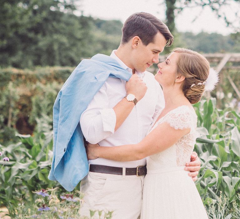 Bride in Lace Wedding Dress with Back Detail | Groom in Pale Blue Jacket &amp; Chino's | Pastel Peter Rabbit Spring Inspiration at River Cottage | Beatrix Potter | Mr McGregor's Garden | Jennifer Jane Photography