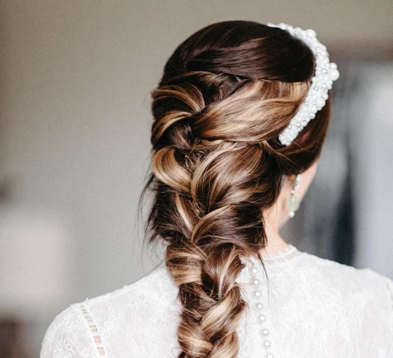 Brides beautiful braid with lace detailed dress