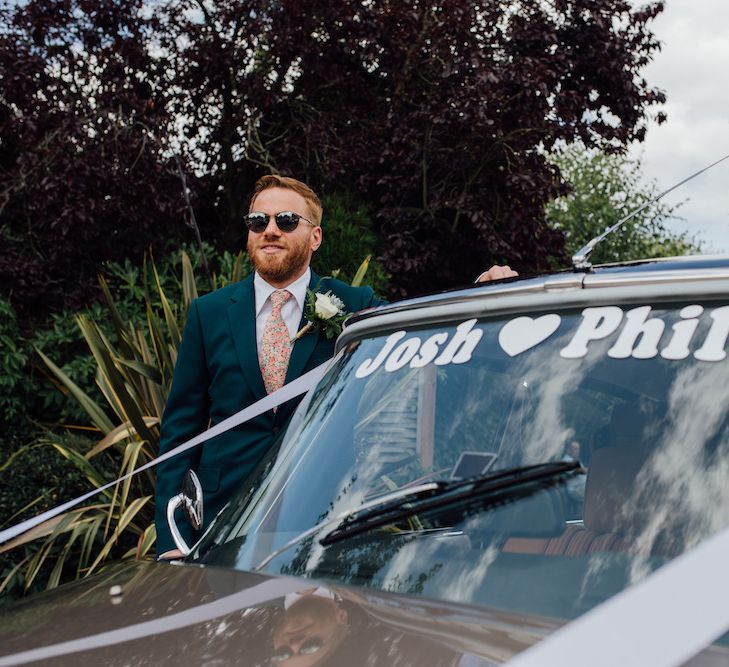 Groom in Paul Smith Suit | Outdoor Wedding Ceremony &amp; Tipi Reception Planned by Benessamy Events | Red on Blonde Photography