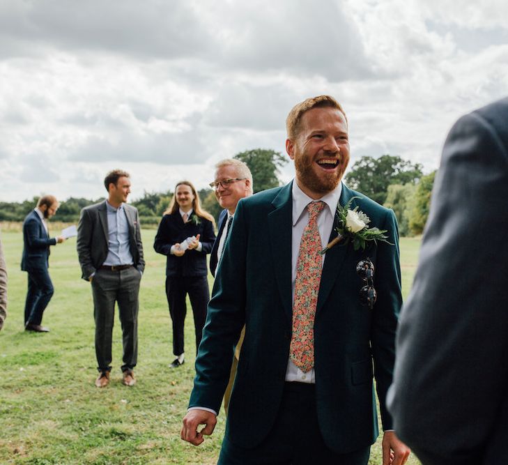 Bride in Paul Smith Suit | Outdoor Wedding Ceremony &amp; Tipi Reception Planned by Benessamy Events | Red on Blonde Photography