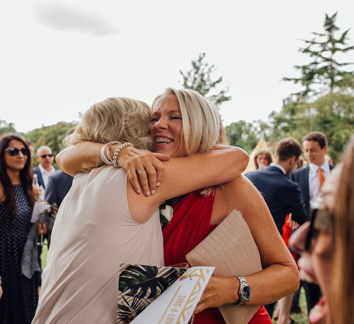 Wedding Guests | Outdoor Wedding Ceremony &amp; Tipi Reception Planned by Benessamy Events | Red on Blonde Photography