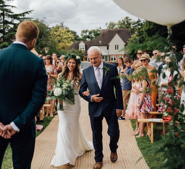 Wedding Ceremony | Bridal Entrance in La Sposa Gown from Mirror Mirror Bridal | Groom in Paul Smith Suit | Outdoor Wedding Ceremony &amp; Tipi Reception Planned by Benessamy Events | Red on Blonde Photography