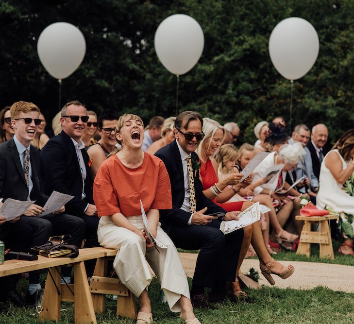 Wedding Ceremony | Giant Balloon Decor | Outdoor Wedding Ceremony &amp; Tipi Reception Planned by Benessamy Events | Red on Blonde Photography