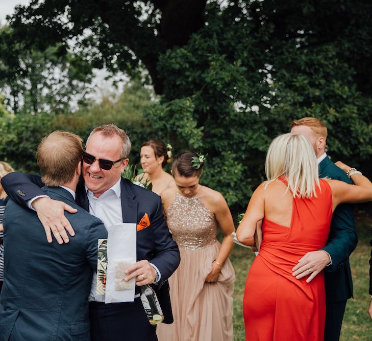 Wedding Guests | Outdoor Wedding Ceremony &amp; Tipi Reception Planned by Benessamy Events | Red on Blonde Photography