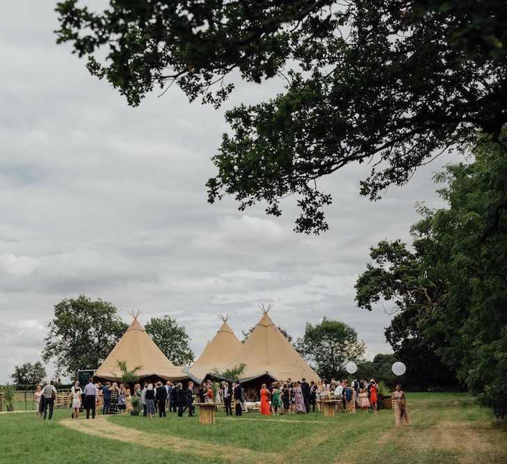 Outdoor Wedding Ceremony &amp; Tipi Reception Planned by Benessamy Events | Red on Blonde Photography