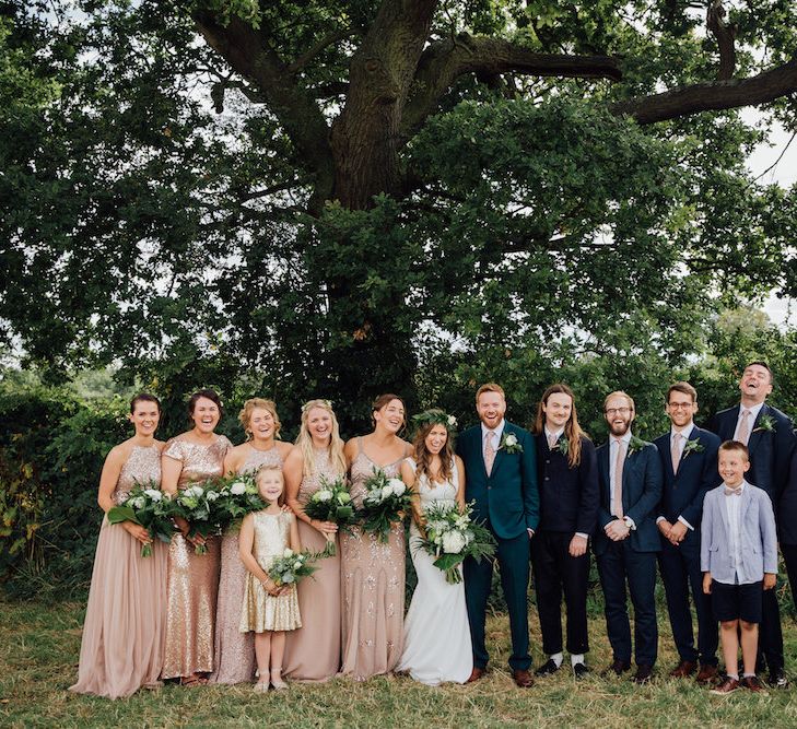 Wedding Party | Bridesmaids in Blush Sequin Gowns | Bride in La Sposa Wedding Dress | Groom in Paul Smith Suit | Outdoor Wedding Ceremony &amp; Tipi Reception Planned by Benessamy Events | Red on Blonde Photography