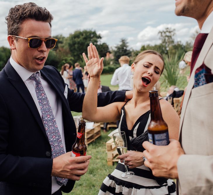 Wedding Guests | Outdoor Wedding Ceremony &amp; Tipi Reception Planned by Benessamy Events | Red on Blonde Photography