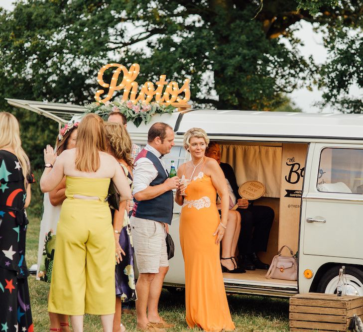 Camper Van Photo Booth | Outdoor Wedding Ceremony &amp; Tipi Reception Planned by Benessamy Events | Red on Blonde Photography