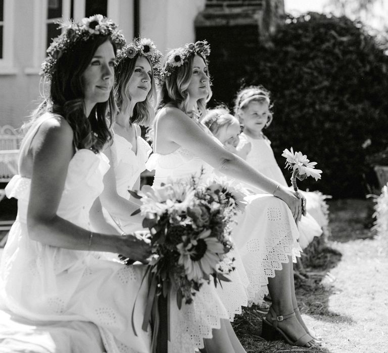 Bridesmaids in White Dresses and Flower Crowns