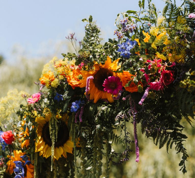 Colourful Moon Gate with Vibrant Flowers