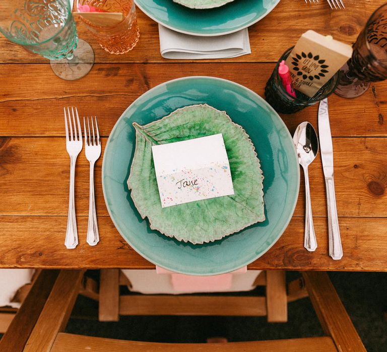 Place Setting with Colourful Tableware and Name Place Cards