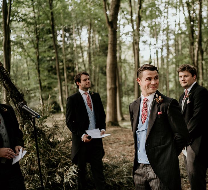 Groom in traditional morning suit for outdoor Evenley Wood Garden wedding ceremony