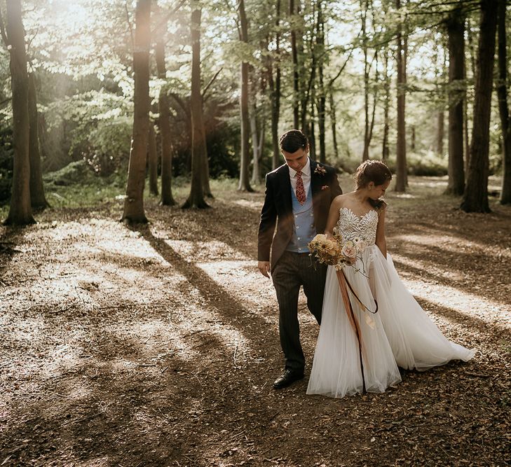 Bride and groom portrait at Evenley Wood Garden wedding