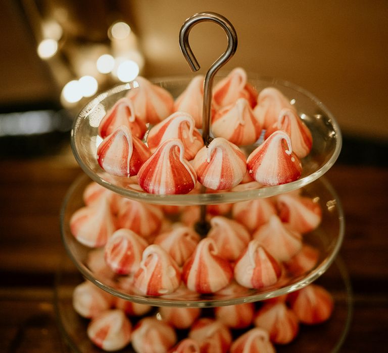 Meringue kisses on glass cake stand at Evenley Wood Garden wedding reception