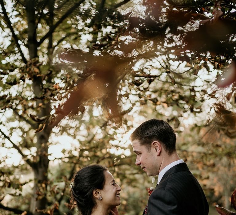 Bride and groom woodland wedding portrait